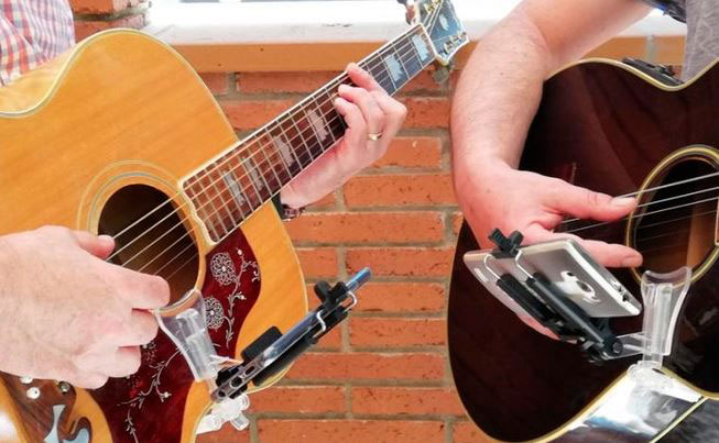 AcouStick: Smartphone Holder for Acoustic Guitars